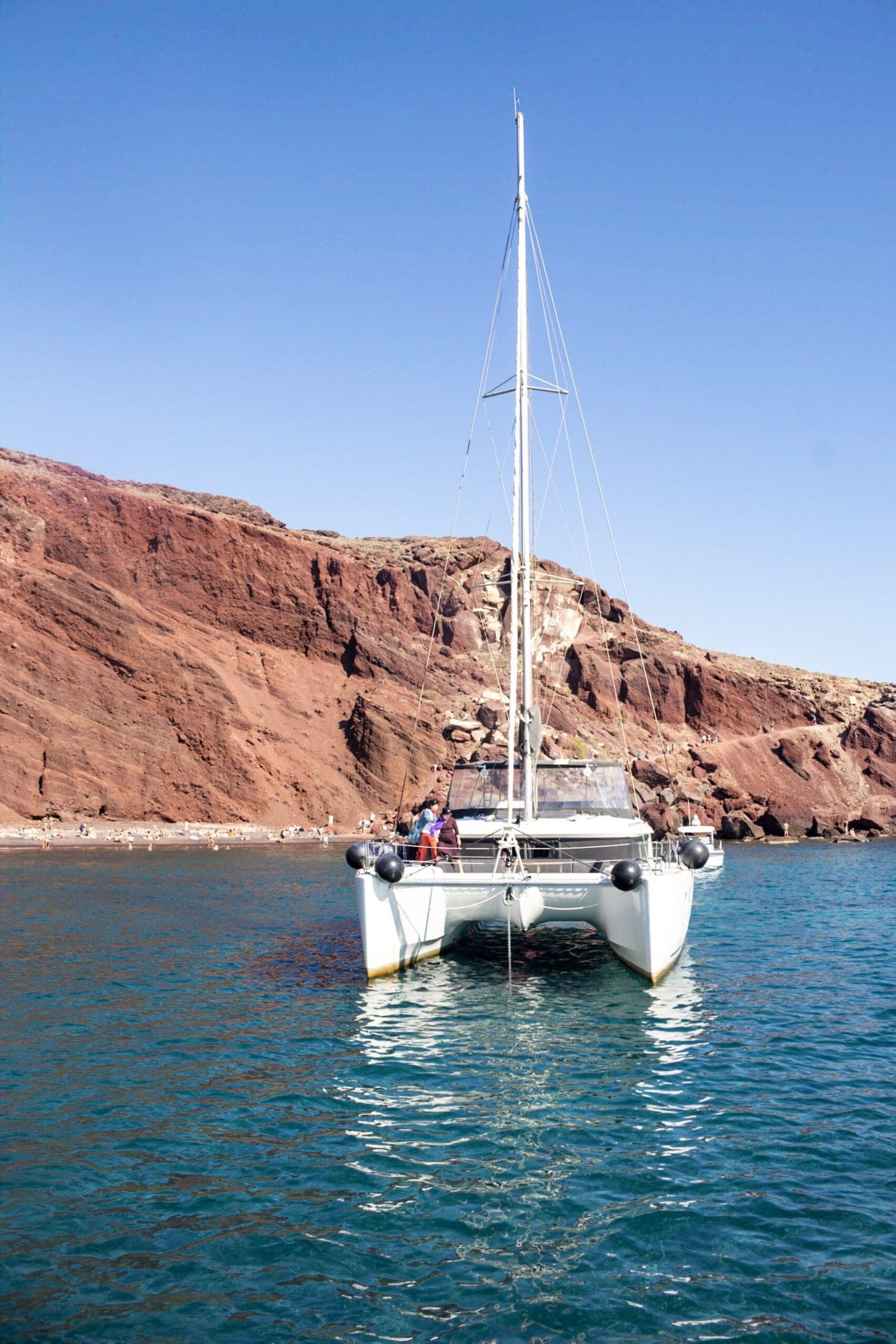 View of a boat in front of the Red Beach