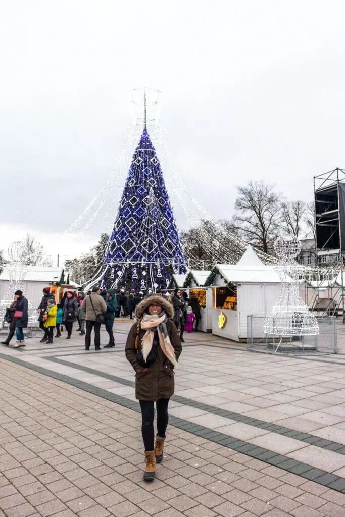 Posing in front of the Christmas Market in Vilnius, Lithuania