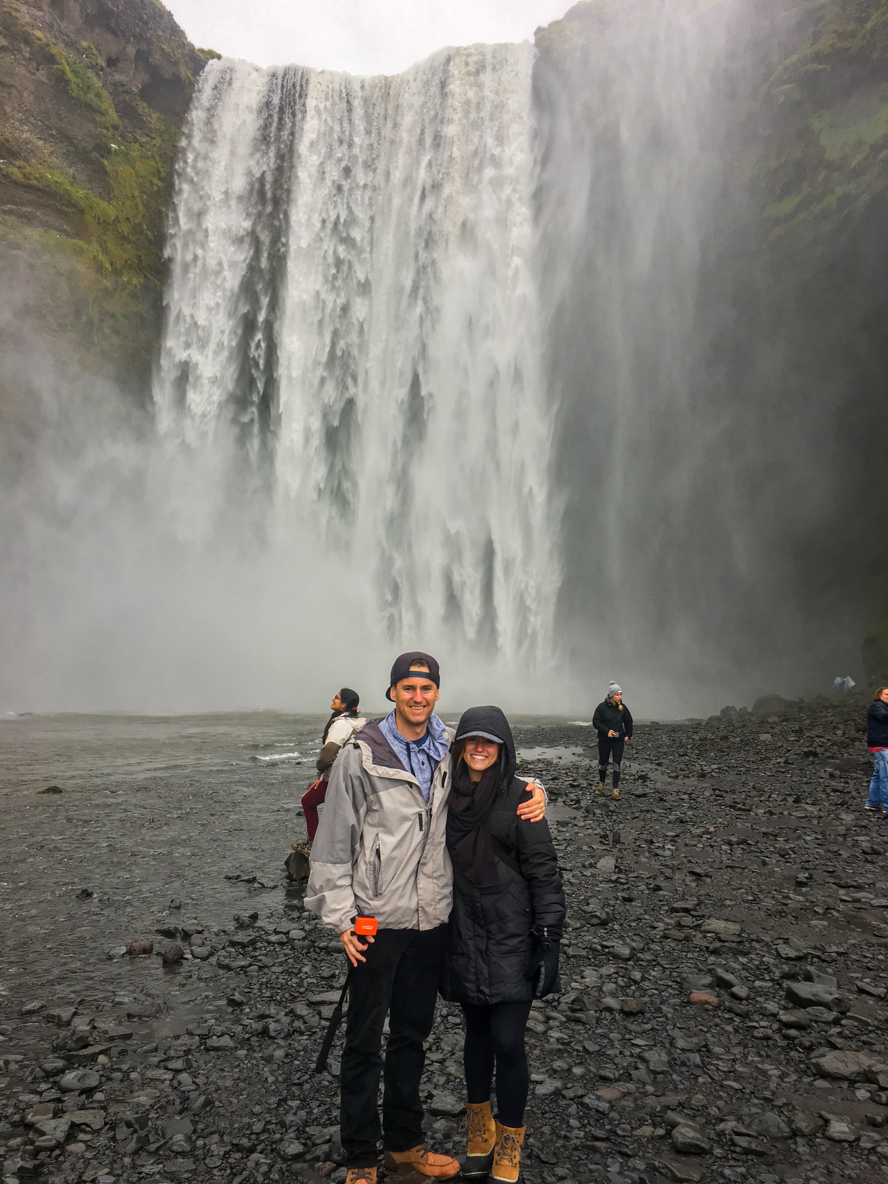 Scenic shot posing in front of Skógafoss Iceland