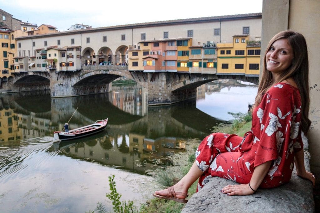 Posing in front of Ponte Vecchio in Florence, Italy