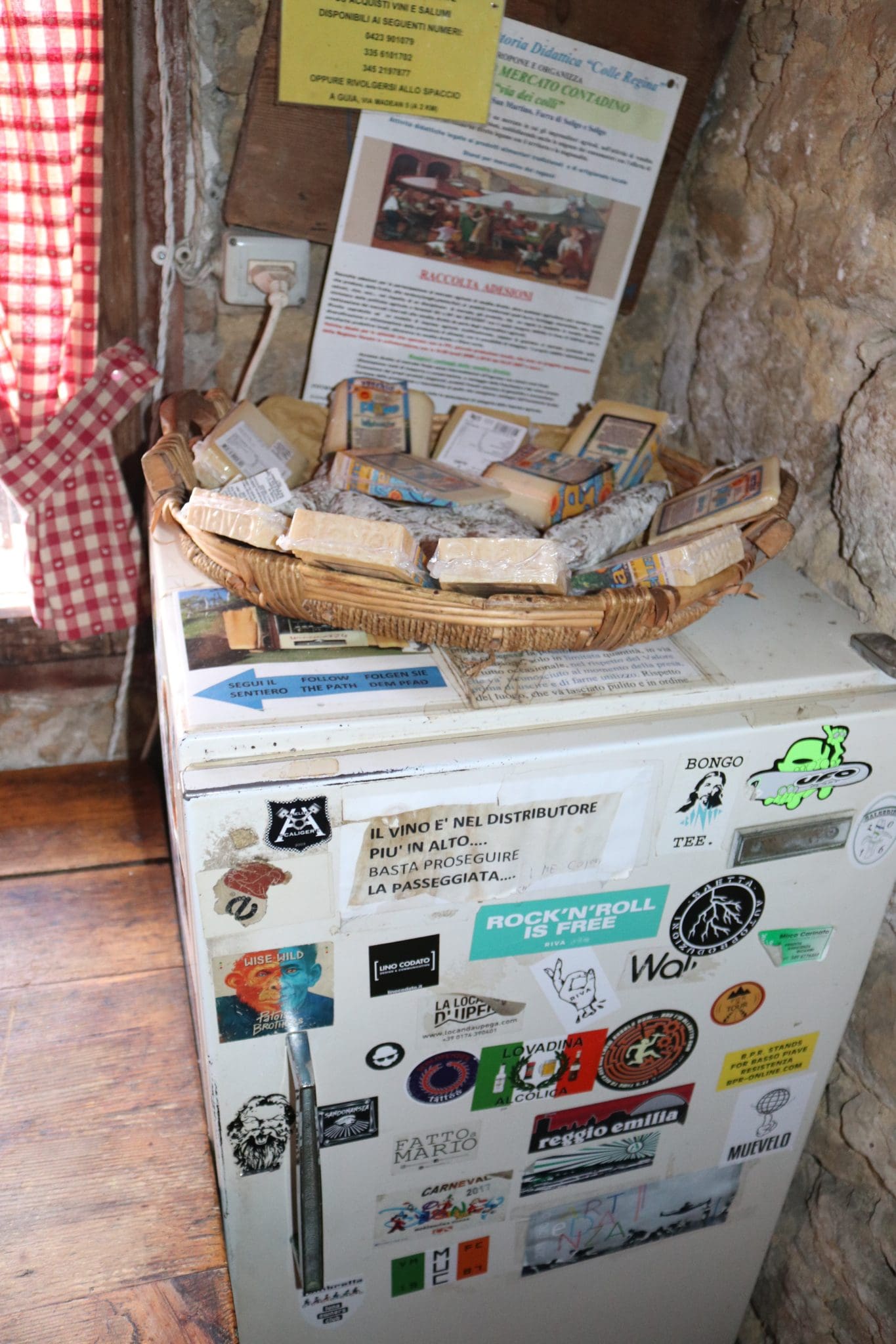 View of cheese & fridge at the honesty bar in Prosecco, Italy