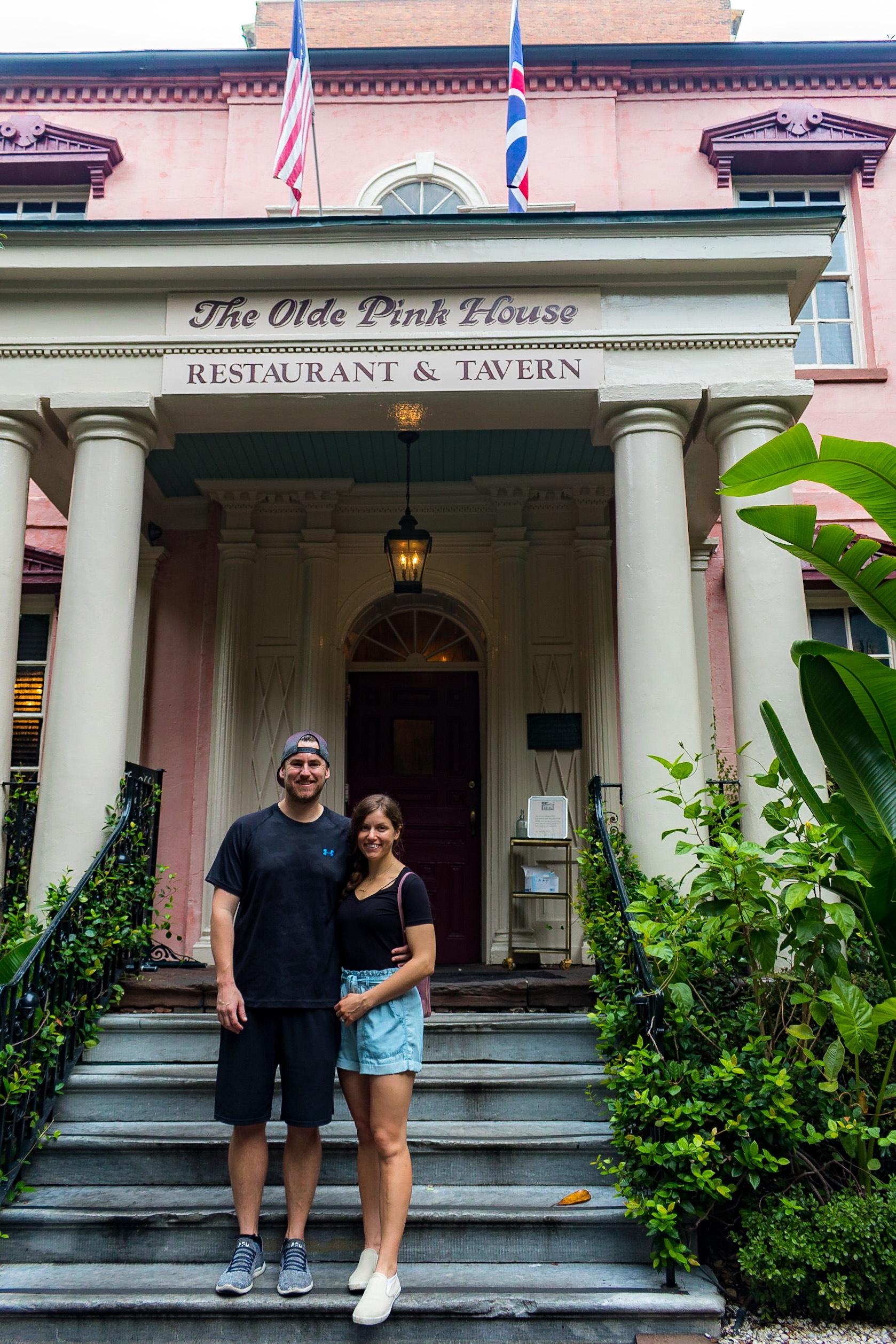 Posing in front of the Pink House in Savannah GA