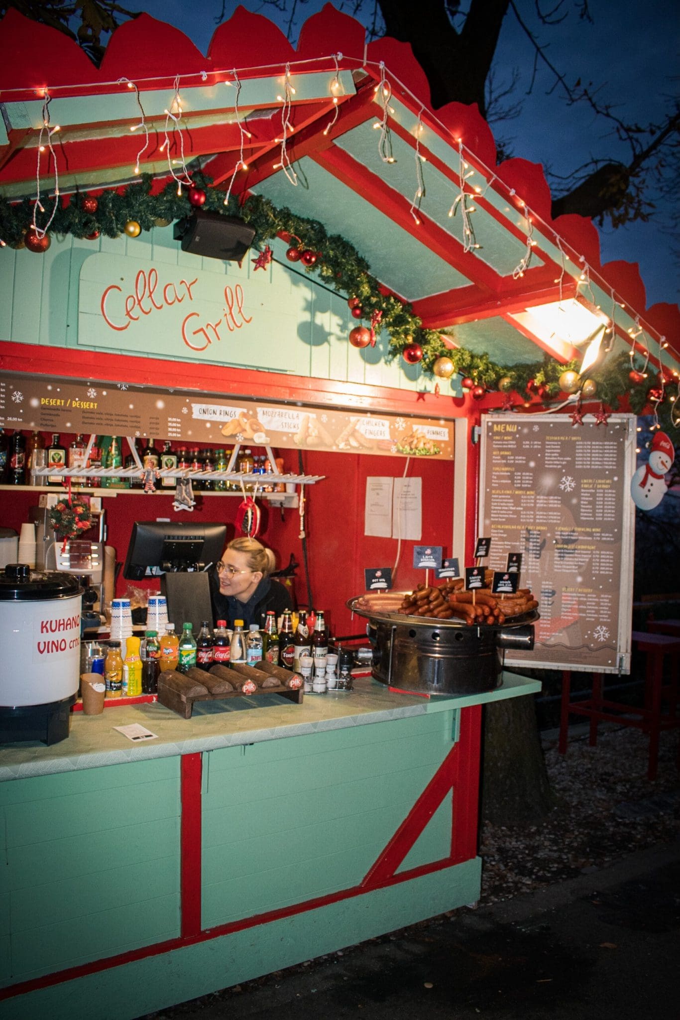 Photo of a Christmas booth selling hot dogs