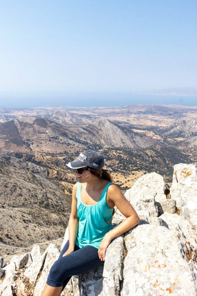 Smiling for a photo at the top of Mount Zas